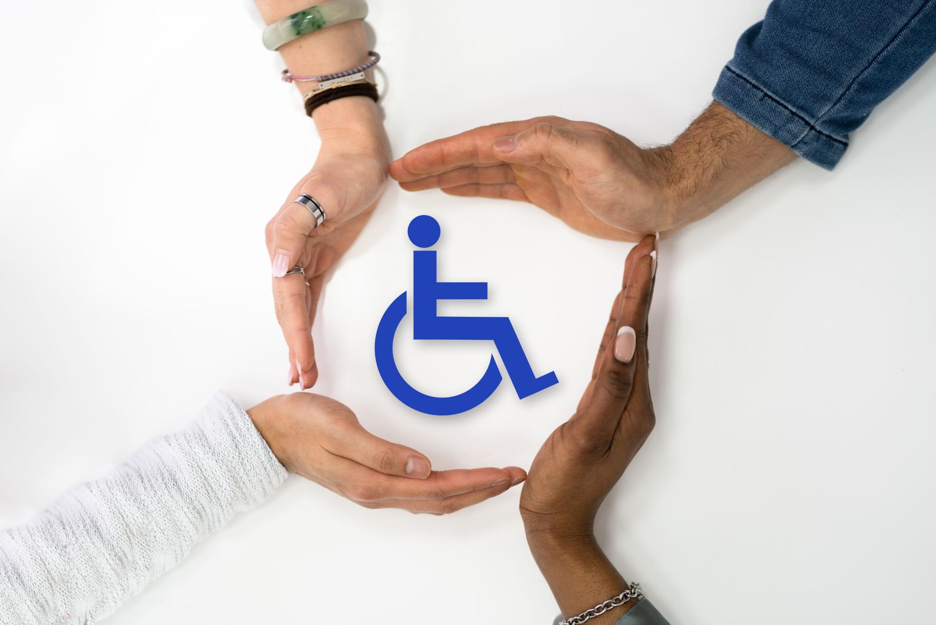 mains autour du sigle handicap